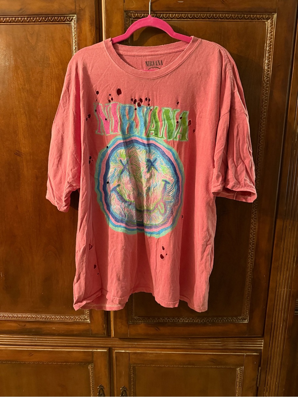 Urban outfitters distressed Nirvana women’s Pink Graphic Band Tee